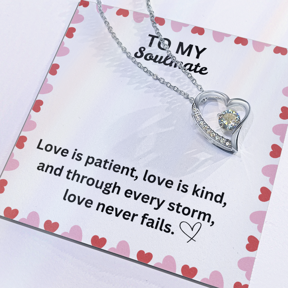 Love Never Fails Heart Necklace