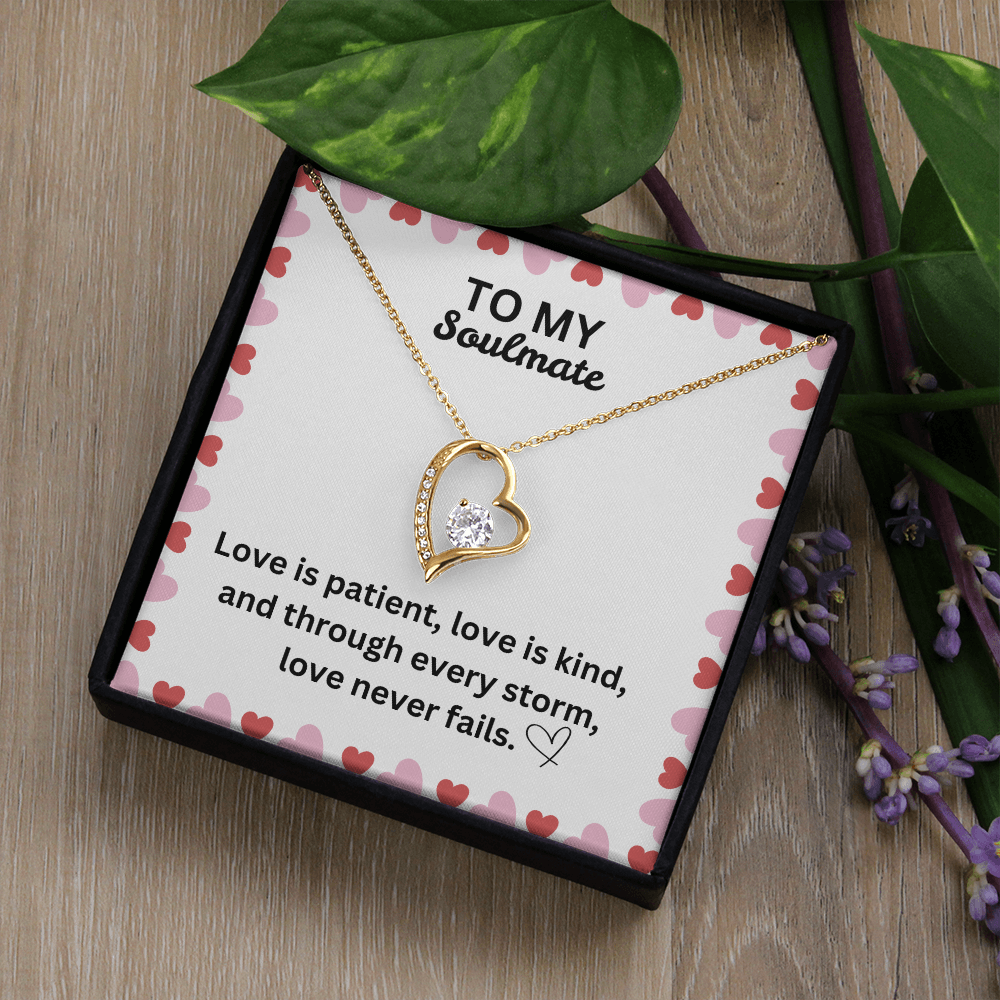 Love Never Fails Heart Necklace