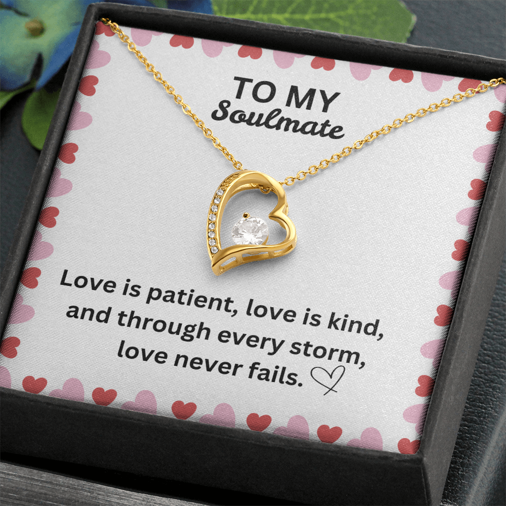 Love Never Fails Heart Necklace